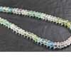 Natural Multi Color Aquamarine Faceted Roundel Beads Strand Length 7 Inches and Size 4.5mm approx.These are 100% genuine aquamarine beads. Aquamarine is blue color variety of Beryl Gemstone species. It usually shows the inclusions visible as the rain effect inside of gemstone. The presence of Fe (iron) in Beryls chemical composition gives it the blue color hence resulting in Blue beryl known as aquamarine. 